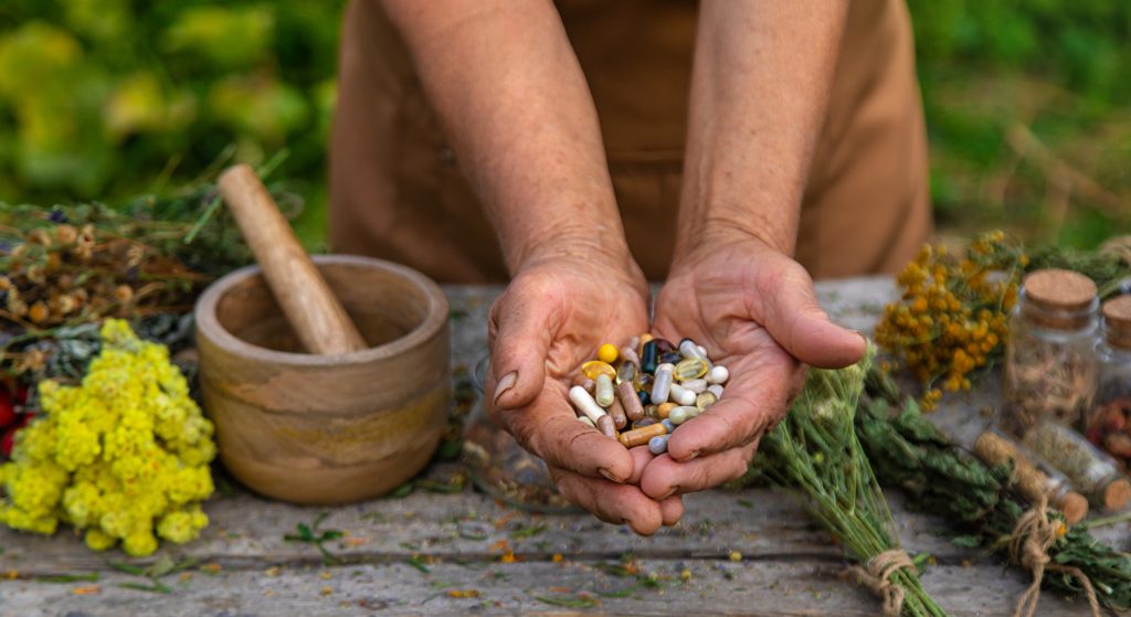 An Elderly Woman Holds Supplements In Her Hands S 2024 12 19 12 25 12 Utc 1024x559