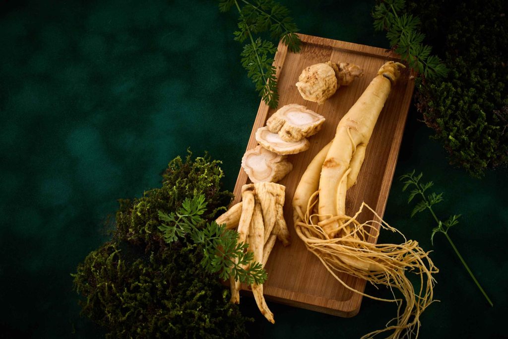 Ginseng Root On A Wooden Tray With Green Foliage B 2026 01 07 06 22 10 Utc 1 1024x683