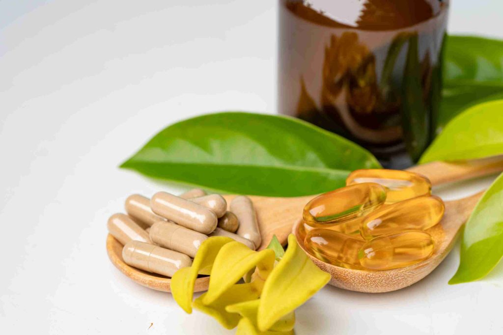 dietary supplements in spoons with green leaves 2026 03 24 00 01 00 utc (1)