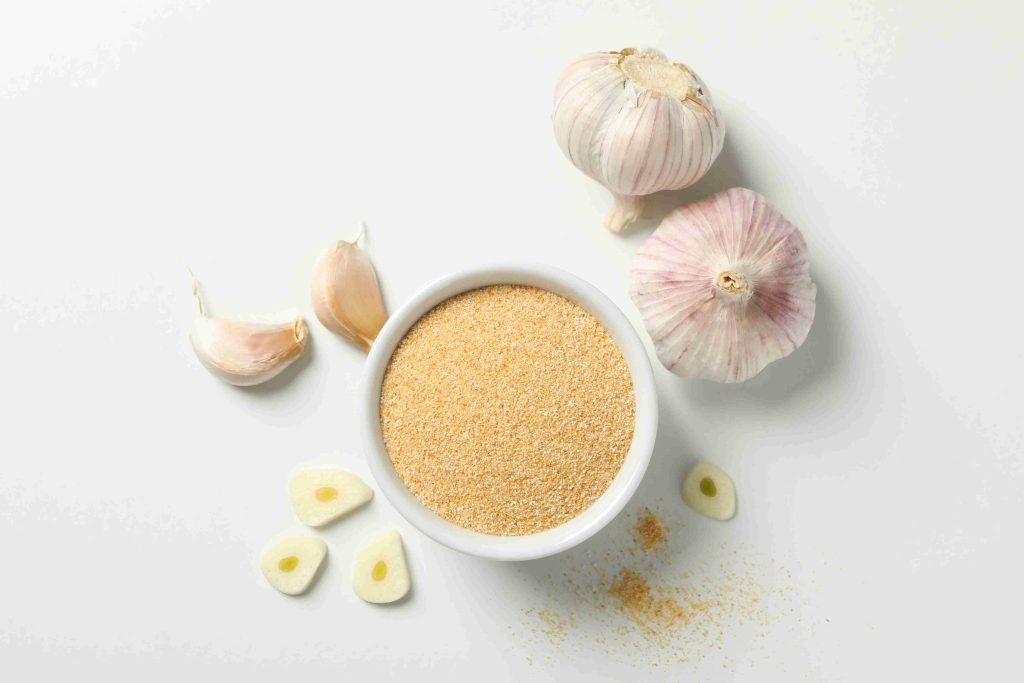 garlic powder and ingredients on white background 2026 03 25 00 56 41 utc (1)