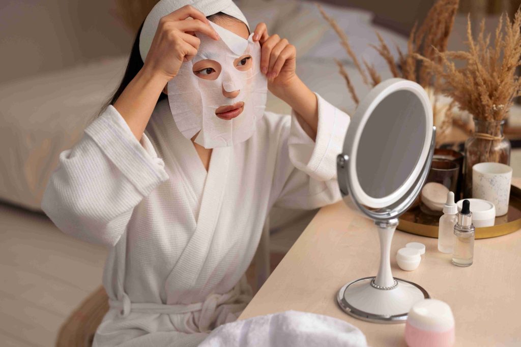 medium shot woman using face mask (1)
