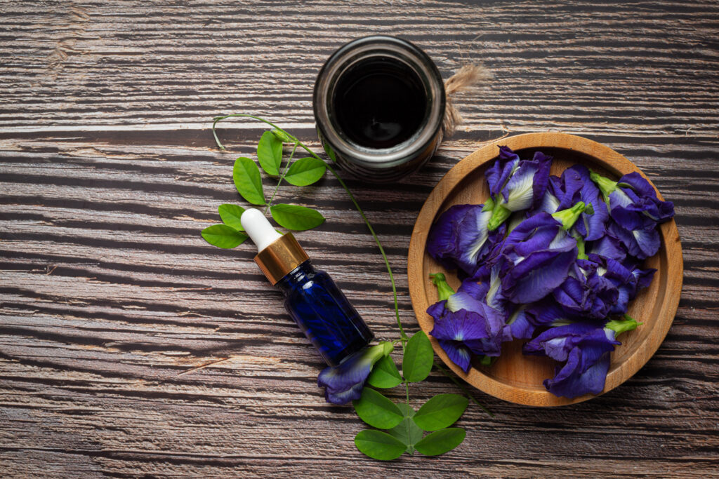 Serum Bottle Butterfly Pea Flower Oil Put Wooden Background 1024x683