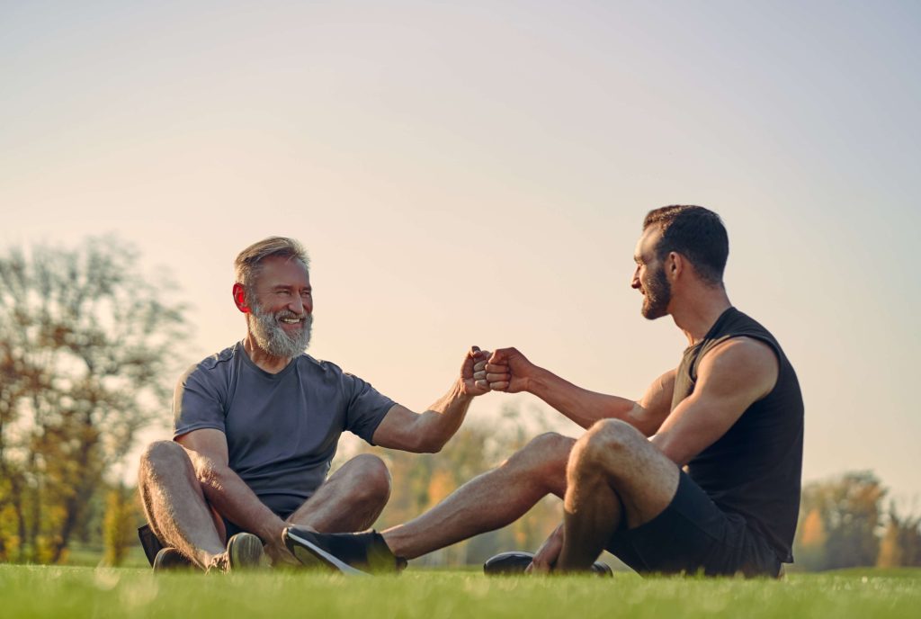 The Old And Young Sportsmen Greeting On The Grass 2026 01 06 00 54 43 Utc 1 1024x688