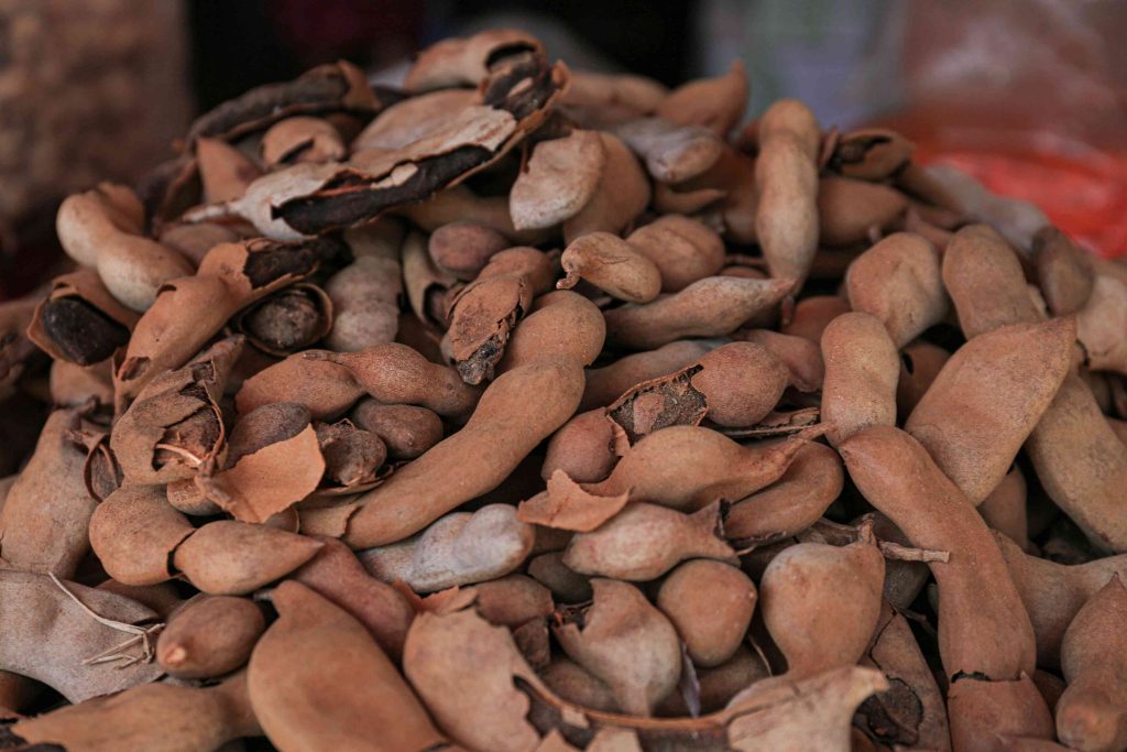 heap of delicious tamarinds on counter at market 2026 01 22 02 12 08 utc (1)